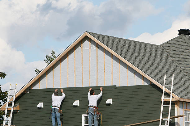 Professional Siding technician working in Point Lookout, NY